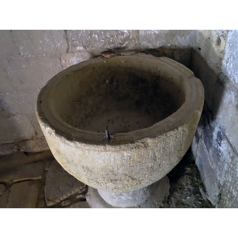 showing also a metal staple still in the rim and some of the damaged areas around it