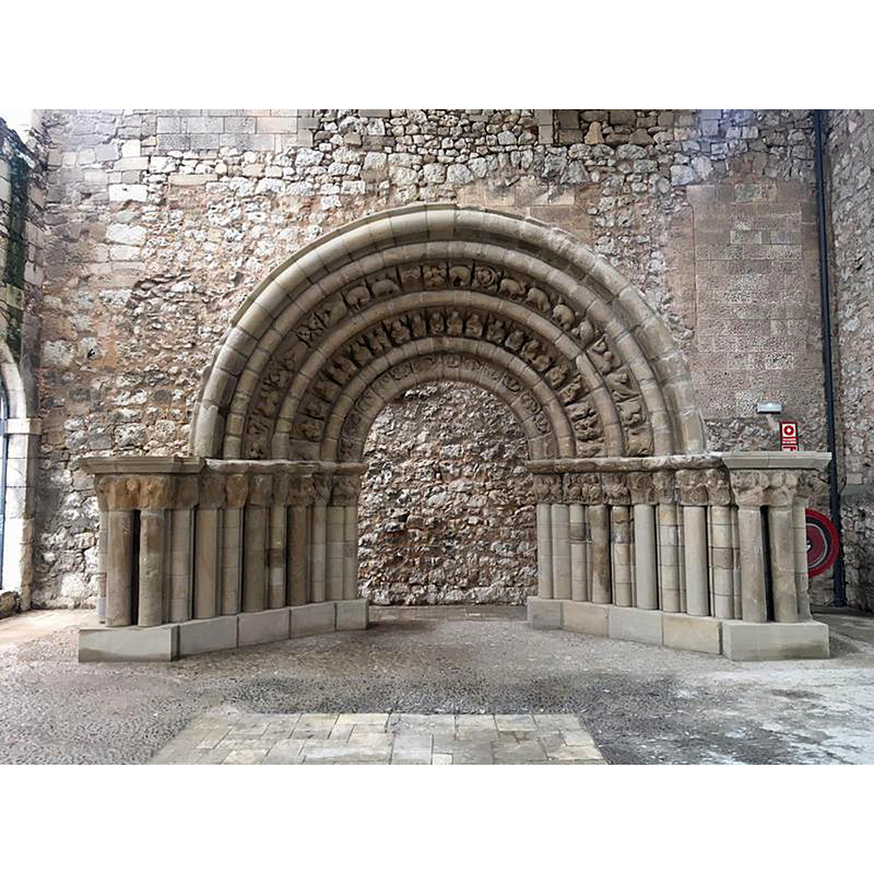 a portal roiginally from the Romanesque parish church of Nuestra Señora de la Llana, in Cerezo de Río Tirón; in 1923 it was discovered dismantled and boxed ready to be shipped to the U.S. It was re-mounted and installed for a time in the Parque/Paseo de la Isla, in the city of Burgos -- it is shown here in February 2019, after its re-installation in the Monasterio de San Juan, also in Burgos capital