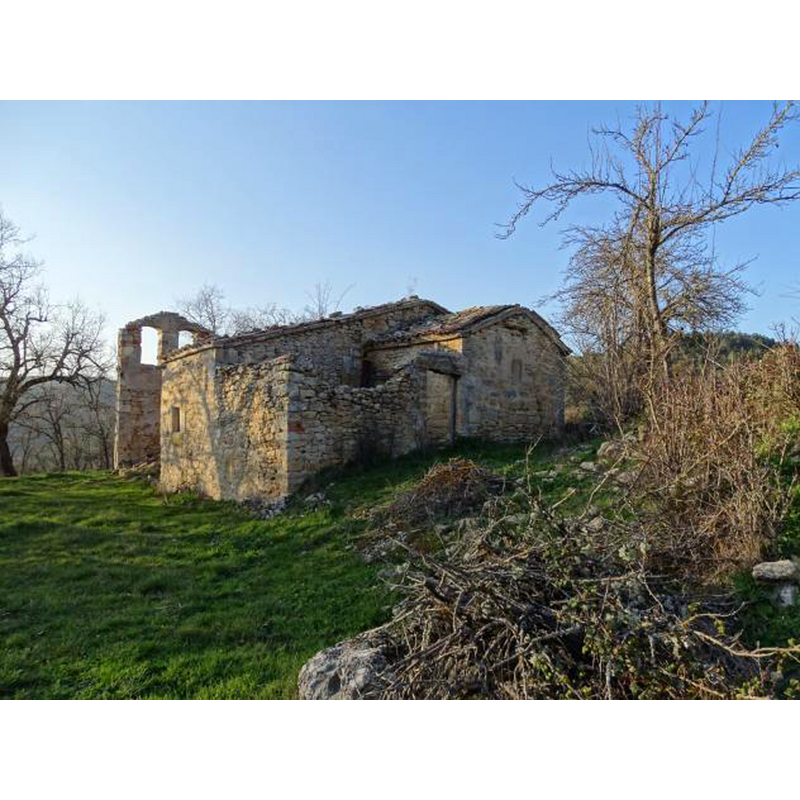 the semi-ruined church in the now [2020] abandoned village