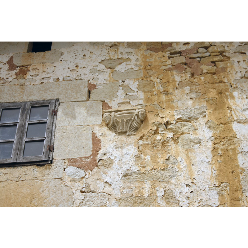 the object has been re-used in a nearby abandoned house