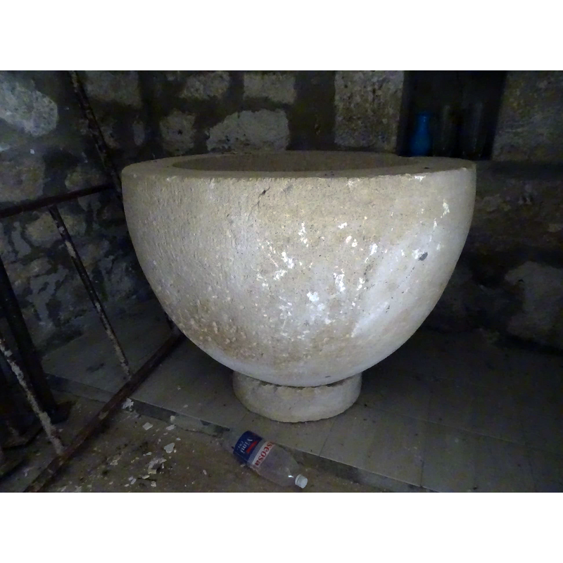 baptismal font originally from the nearby church of Ahedo de Bureba and now [ca. 2020] in a chapel of this church