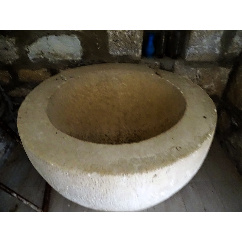 baptismal font originally from the nearby church of Ahedo de Bureba and now [ca. 2020] in a chapel of this church