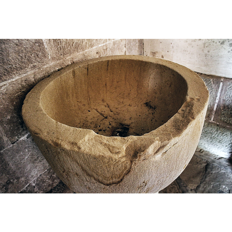 showing the damage to the rim and the centre drain