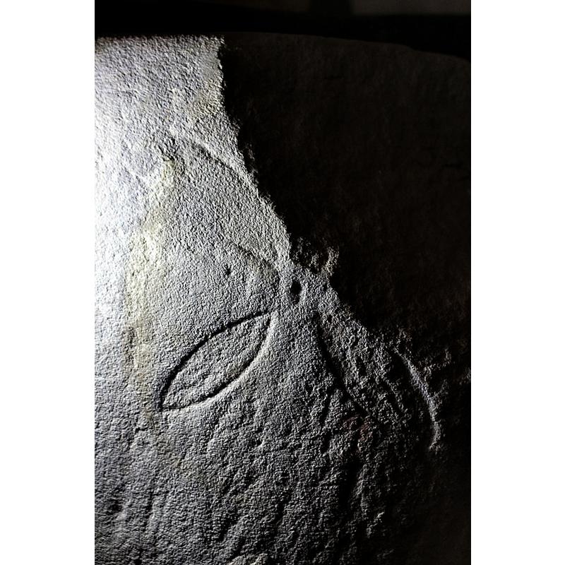 another of the Maltese crosses on the sides -- the dark shape on the right is the damage where part of the stone broke off