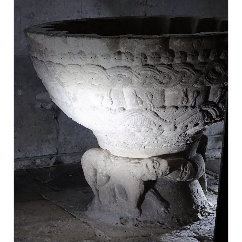 background on which the rest of the carving is superimposed