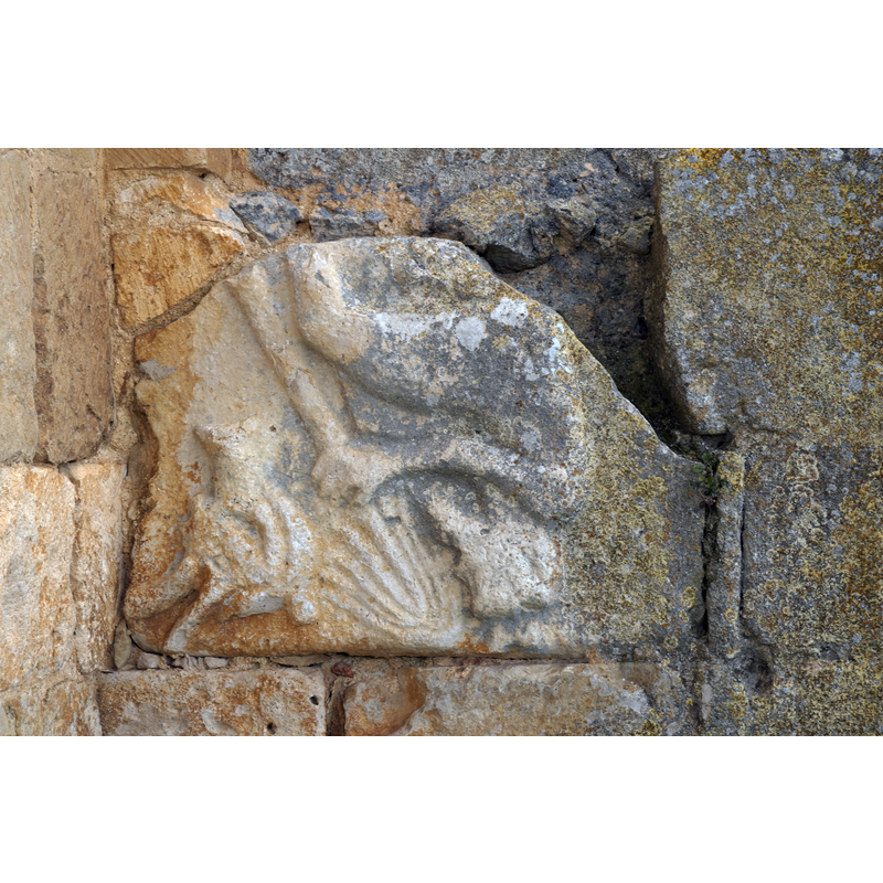 Source: "Ermita del Santo Cristo de San Sebastián in Coruña del Conde in der Provinz Burgos ((Kastilien-León/Spanien), Spolie" -- some of the expolia re-used in this church probably came from the nearby site of the former Roman city of Clunia Sulpitia