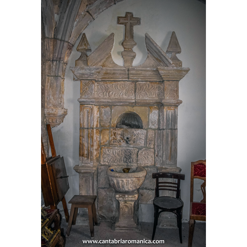 the stoup and its background, probably from one of the post-medieval modifications of this church