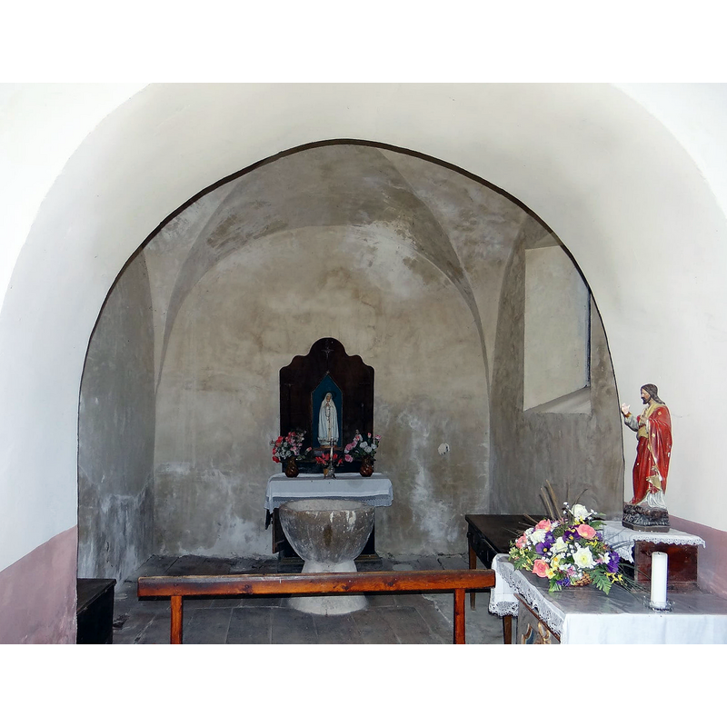 side chapel now housing the old font