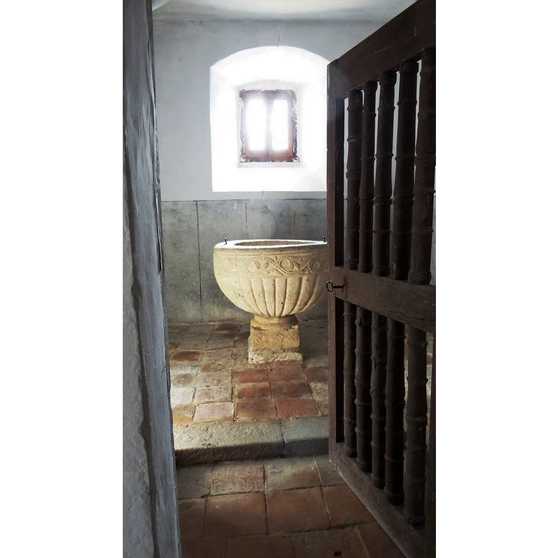 a narrow chapel in the south wall, west end of the church interior