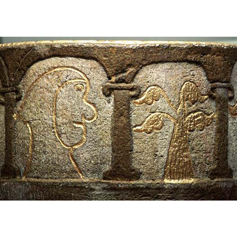 the painting and some of the carving are of a later date than the font itself