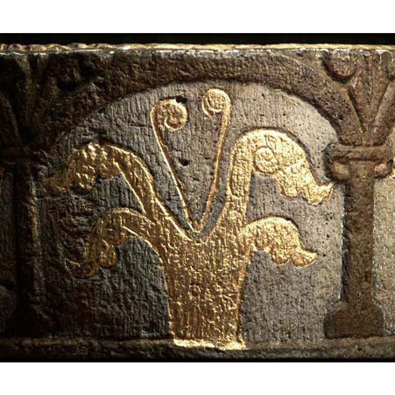 the painting and some of the carving are of a later date than the font itself