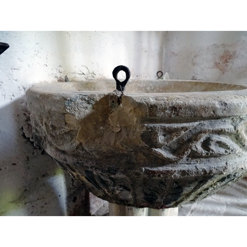 showing the large damage caused by the metal staple in the foreground