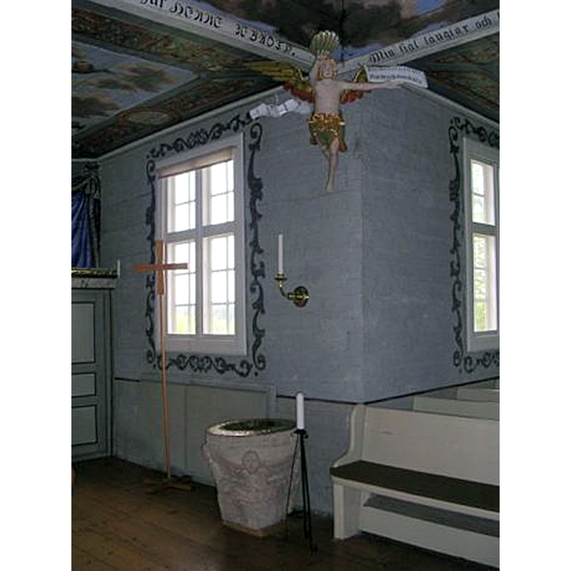 The 'dopängel ' above the font was made in 1722 by Jonas Ullberg, of Velinga.