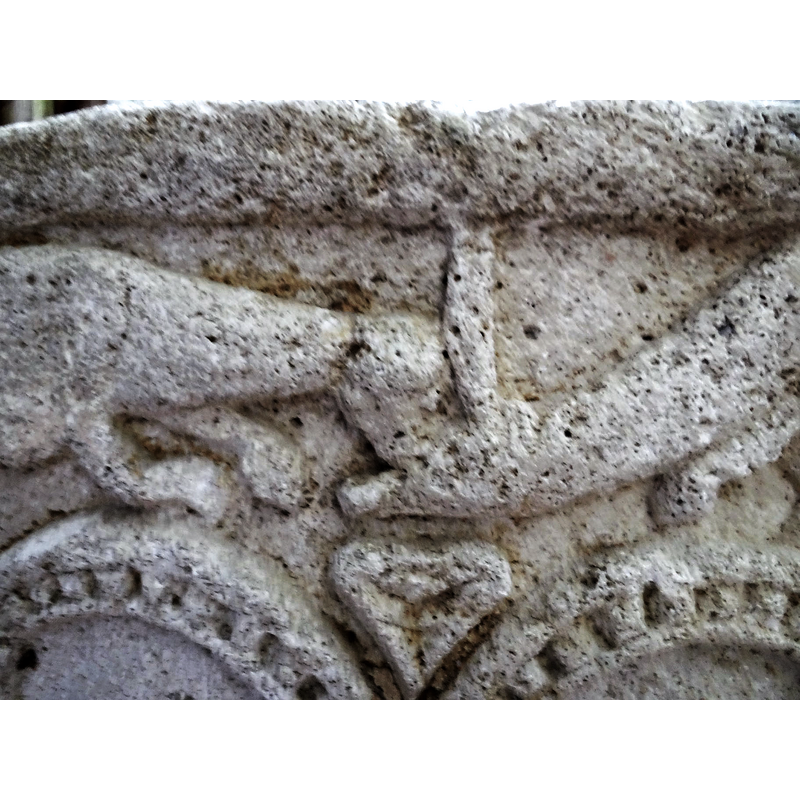 a scene in which two quadrupeds are engaged -- Valle Barreda [cf. FontNotes] suggests a feline attacking a deer