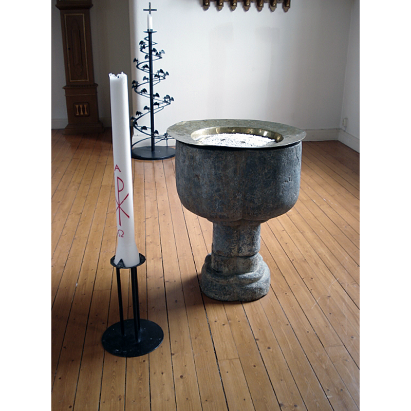 the wall behind the font is the south pillar of the chancel arch