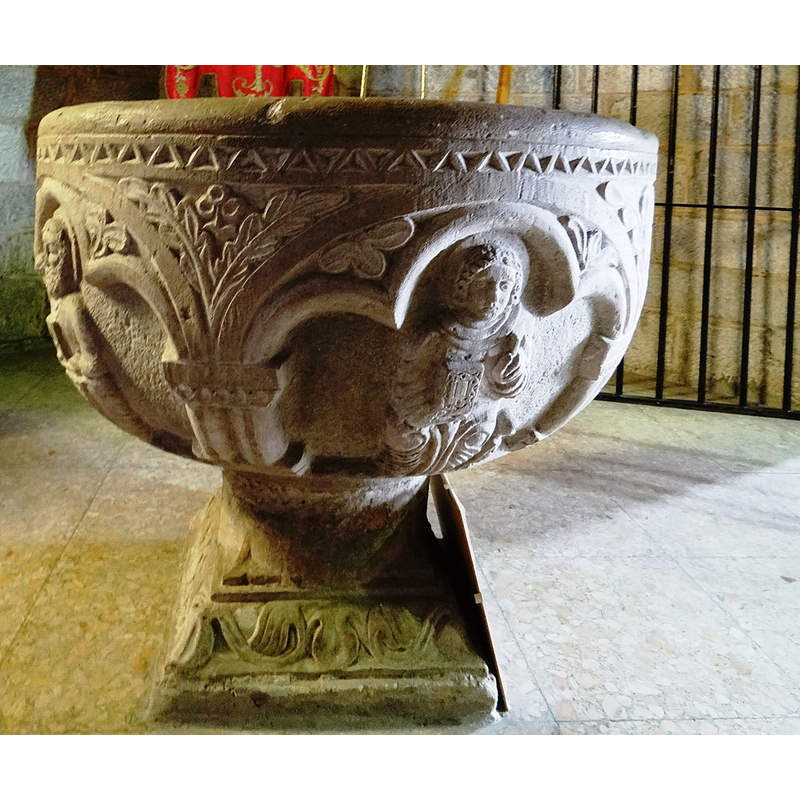 this is the replica font in use in the parish church at Caleruega