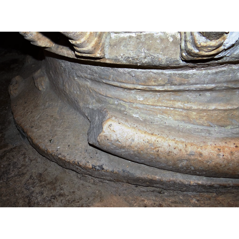 the damaged area of the zoomachia: on the far left are the paws of the quadruped [lion?] fighting the snake; on the right is the broken body of the snake