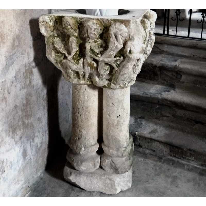 the steps behind the stoup lead up to the chancel, left [north] side