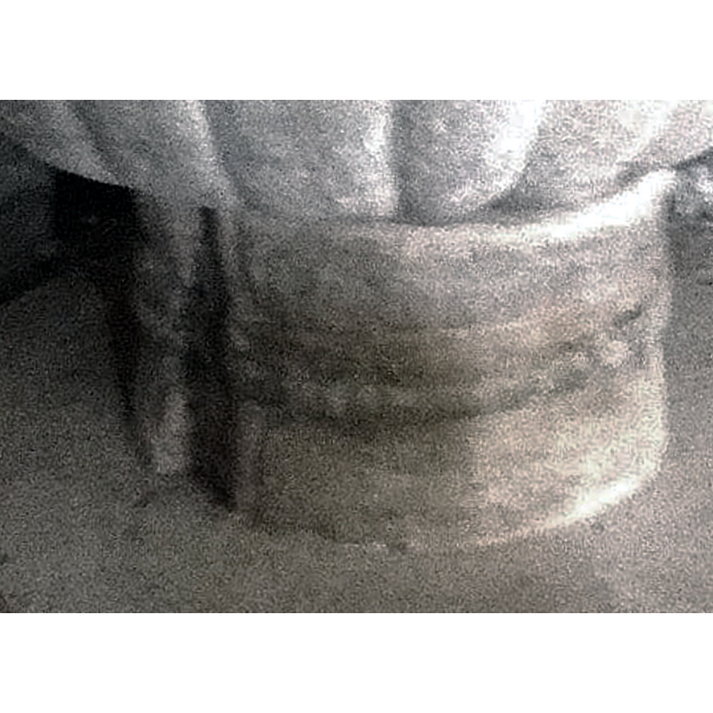 showing the damage or vertical gap on the left side of the stem of the base