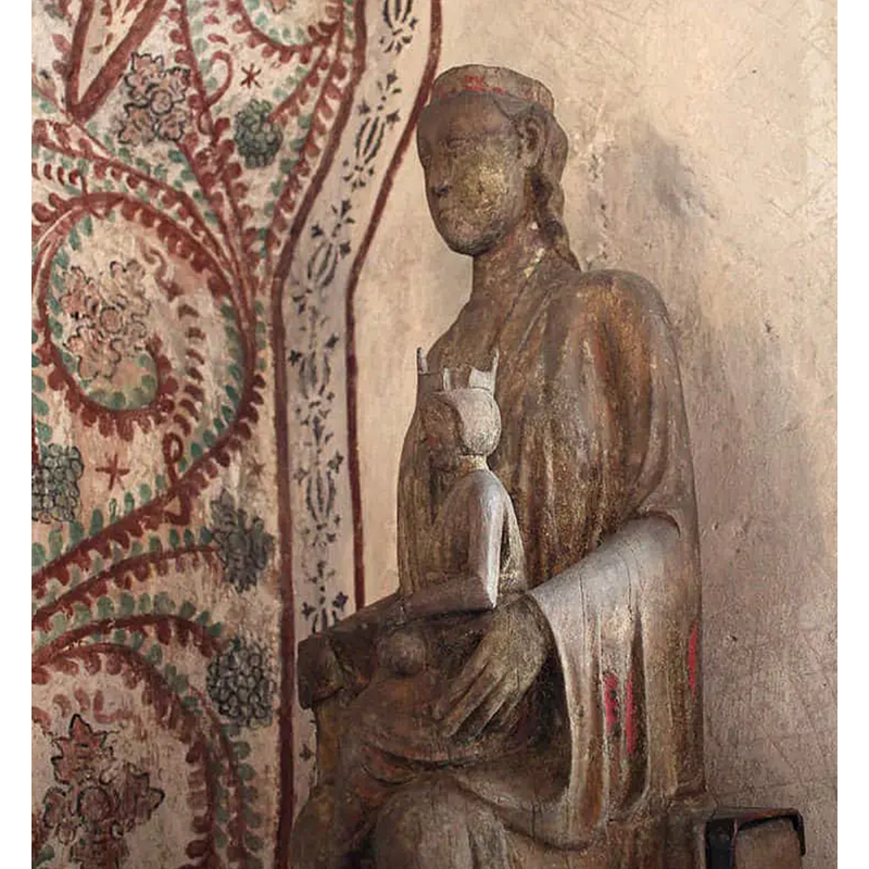 Source caption: "Madonna sculpture from the 13th century."