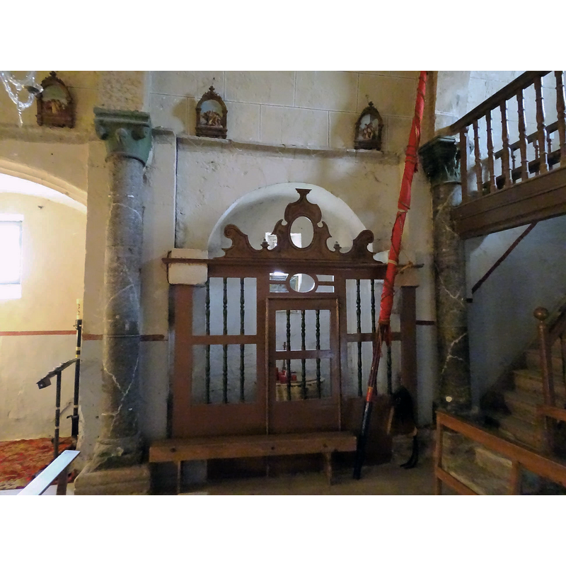 showing the southeast corner of the nace with the south baptistery and the stairs leading to the west gallery