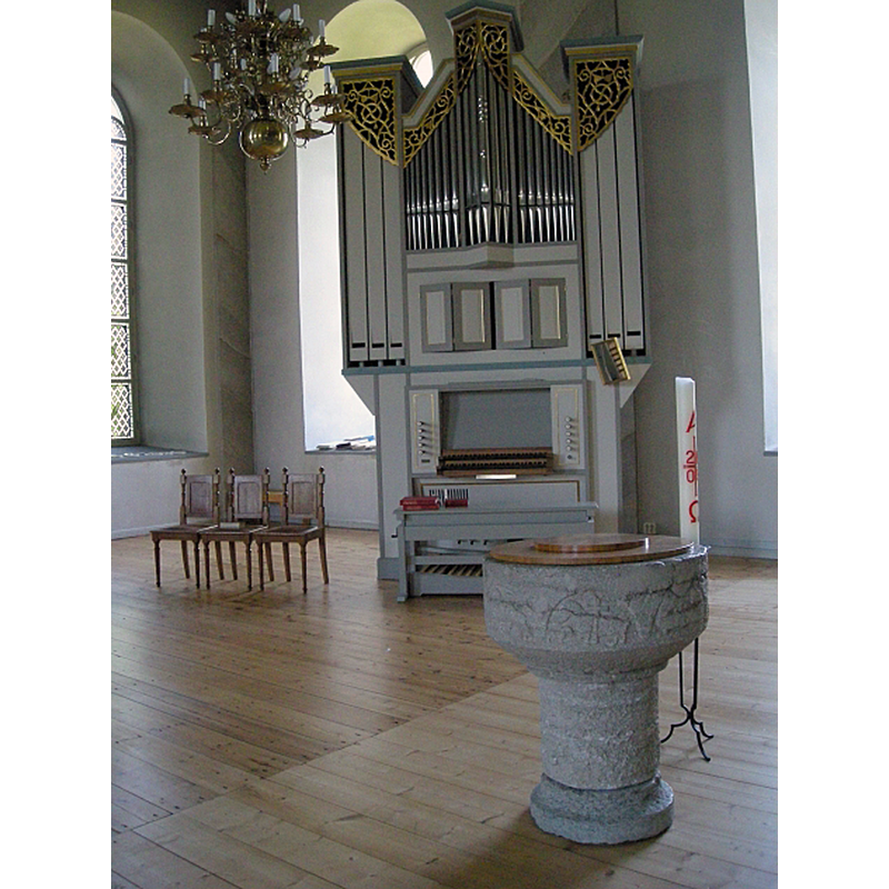showing the medieval font in the new church