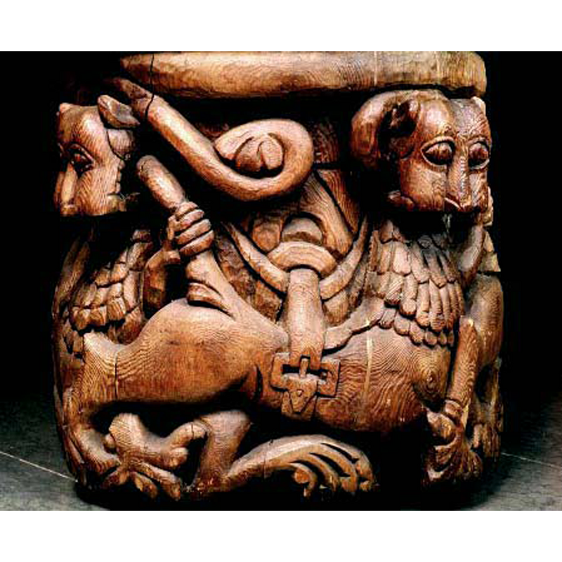each of the four lions appears to hold the tail of the next lion; the buckles around the middle of the lion's bodies appear to be attached to something in the backgrround
