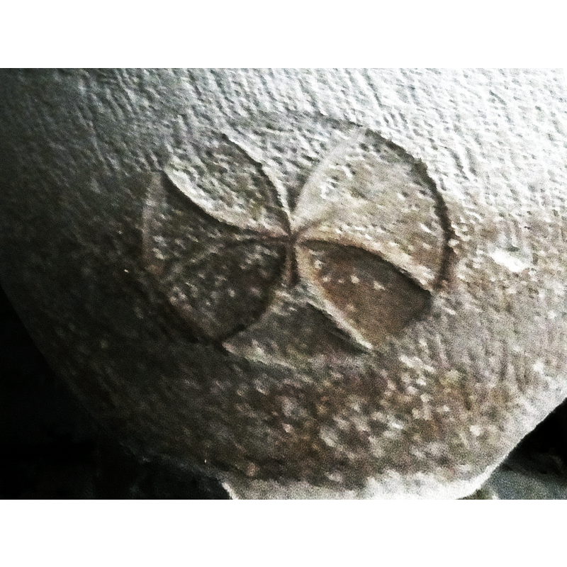 showing one of the four inscribed Maltese crosses on this font