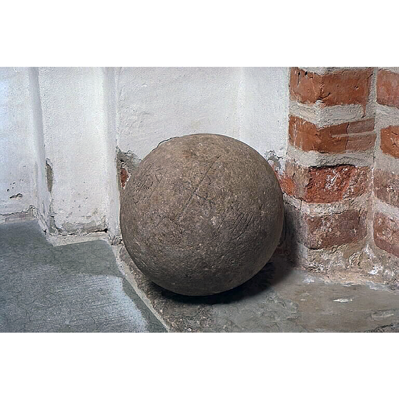 Source caption: "Nederluleå kyrka (Gammelstads kyrka) [...] Stenklot av granit med ristningar." [NB: could this be one of thwe stones used to warm up the water inside the baptismal font? or, a cannon ball?]