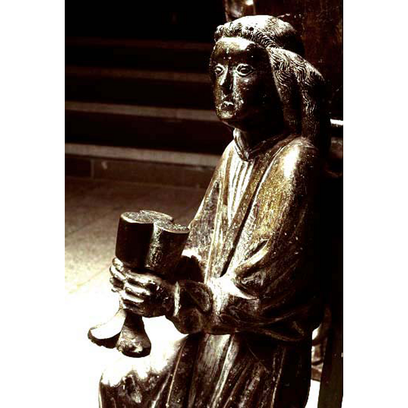 one angel lacks its hands and the object they held; another angel holds a chalice