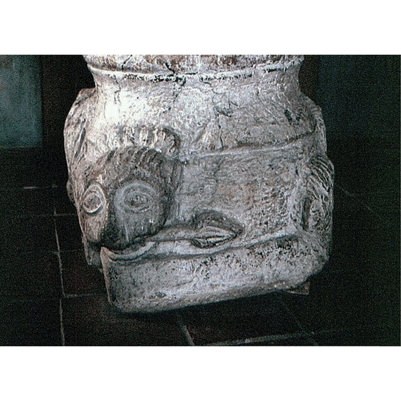 Source caption: "Blentarp kyrka i Skåne, Sverige. Blentarp kirke, døbefont" -- a lion bites the tail of another lion