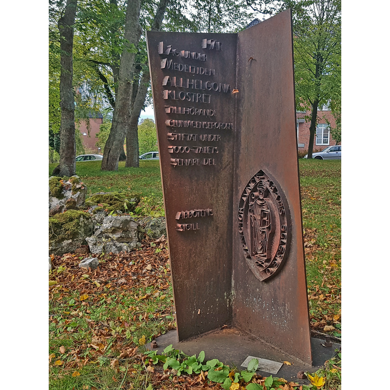 Source caption: "Minnesmärke på platsen för Allhelgonaklostret" -- the modern monument marks the location of the demolished monastery in Lund