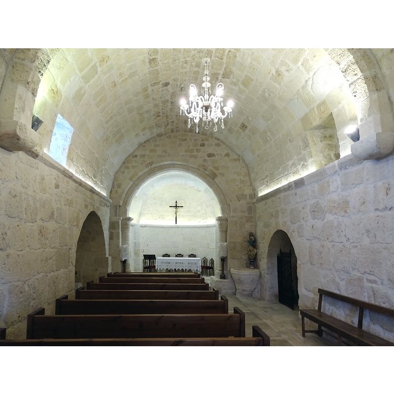 showing the font half-vuilt against the southeast corner of the nave