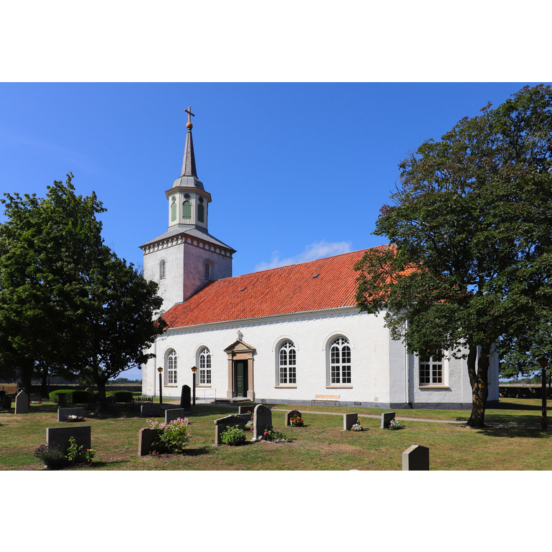 Source caption: "Sandby kyrka. 1860 påbörjade byggmästare Peter Isberg arbetet med uppförandet av Sanby kyrka. Isberg hade själv gjort ritningarna, som bearbetats av Johan Fredrik Åbom vid Överintendentsämbetet. Kyrkan stod färdig 1863 . Kyrkobyggnaden fick ett tidsenlig stil präglad av nyklassicism."