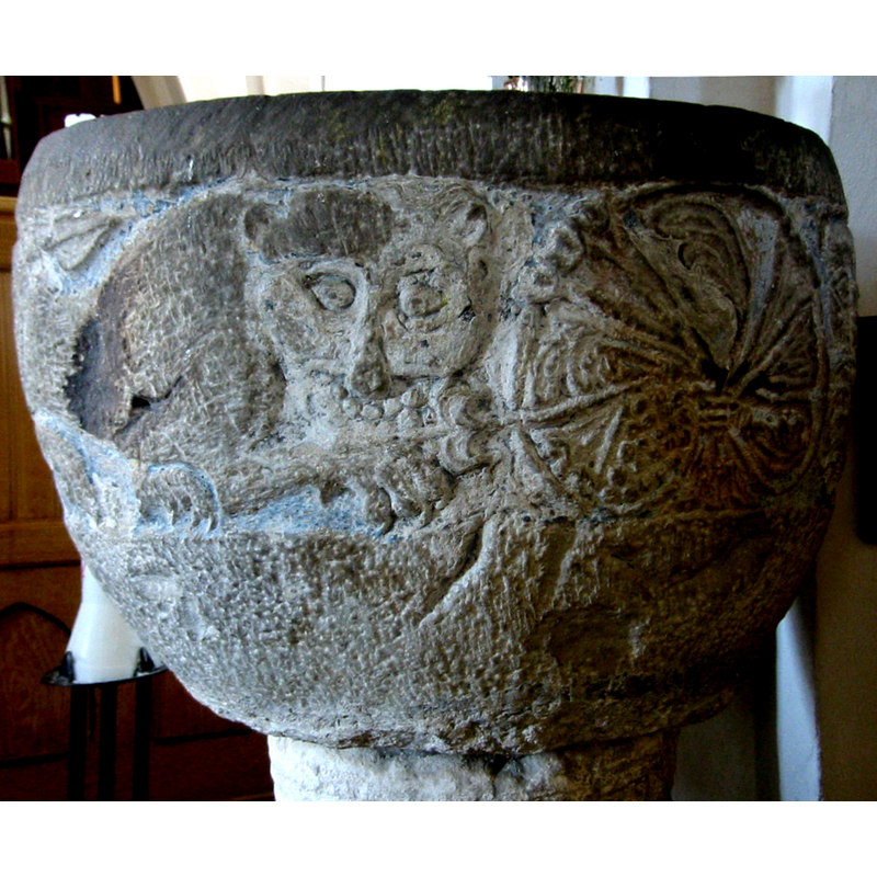 Source caption: "Baptismal font from Oxie church in Sweden about 1150."