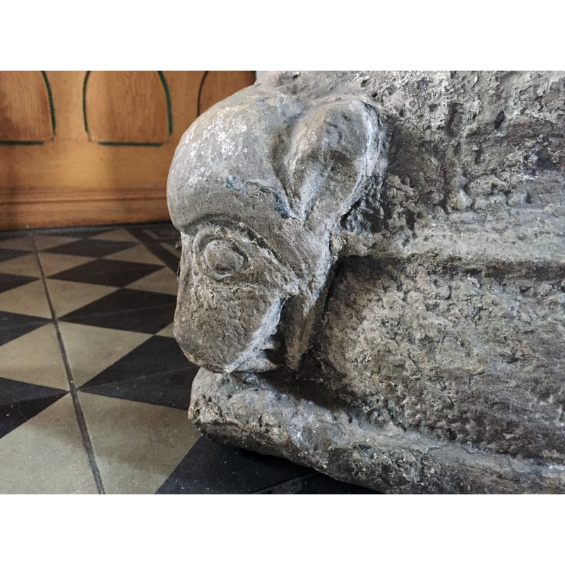Source caption: " Baptismal font in Oxie Church, detail"