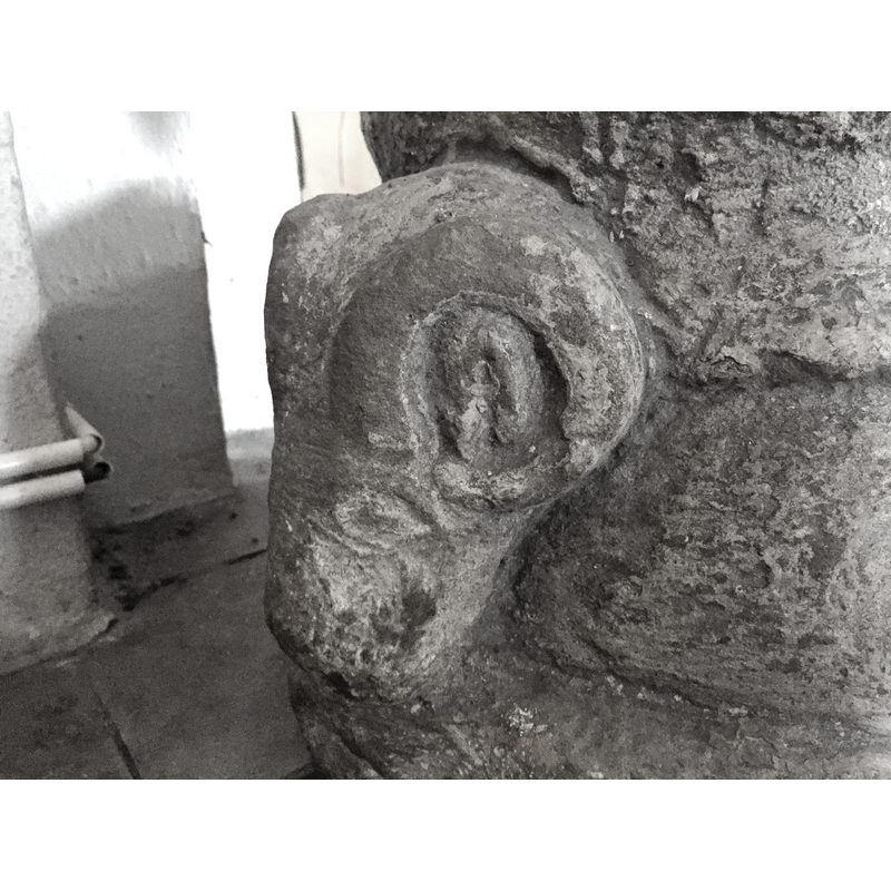 Source caption: " Baptismal font in Oxie Church, detail"