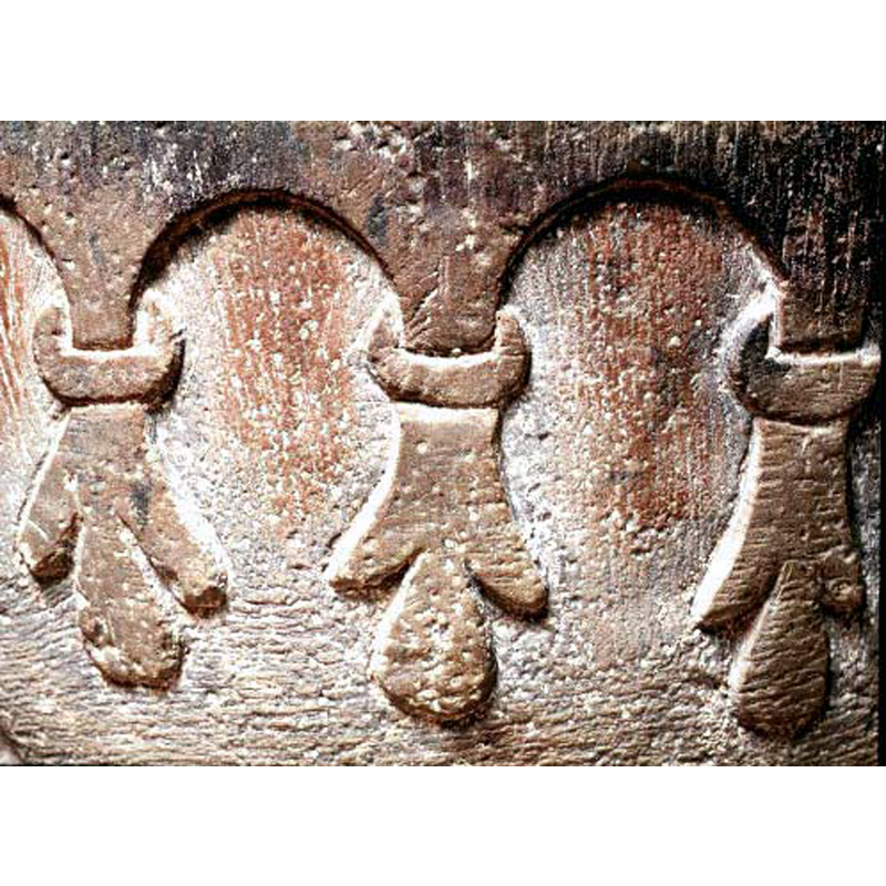 a band of fleurs de lis or simple palmette-like motifs the place of the supports