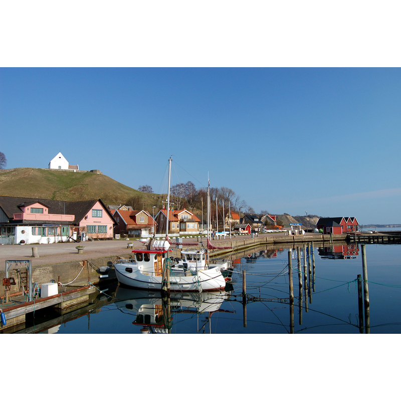 Sankt Ibb's old church atop the hill overlooking Kyrkbacken harbour on the island of Ven