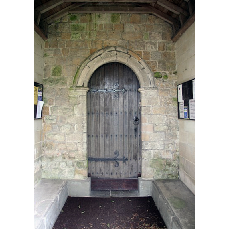 Source caption: "Transitional doorway South door of St.Helen's church, just about a pointed arch with single chamfer, of c1200 and Transitional architectural phase from Romanesque to Gothic"