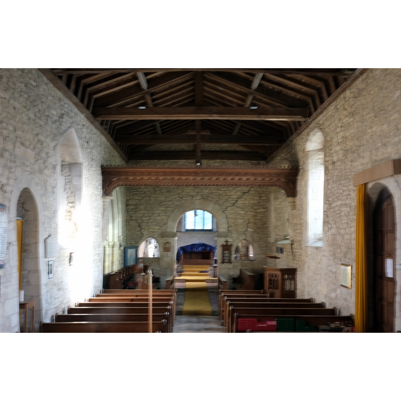 Source caption: "The Church of St Mary: Chancel Arch and rood. The cross-beam surmounted with a cross (rather than a crucifix) is modern, and probably dates from the same period as the roof (1974)."