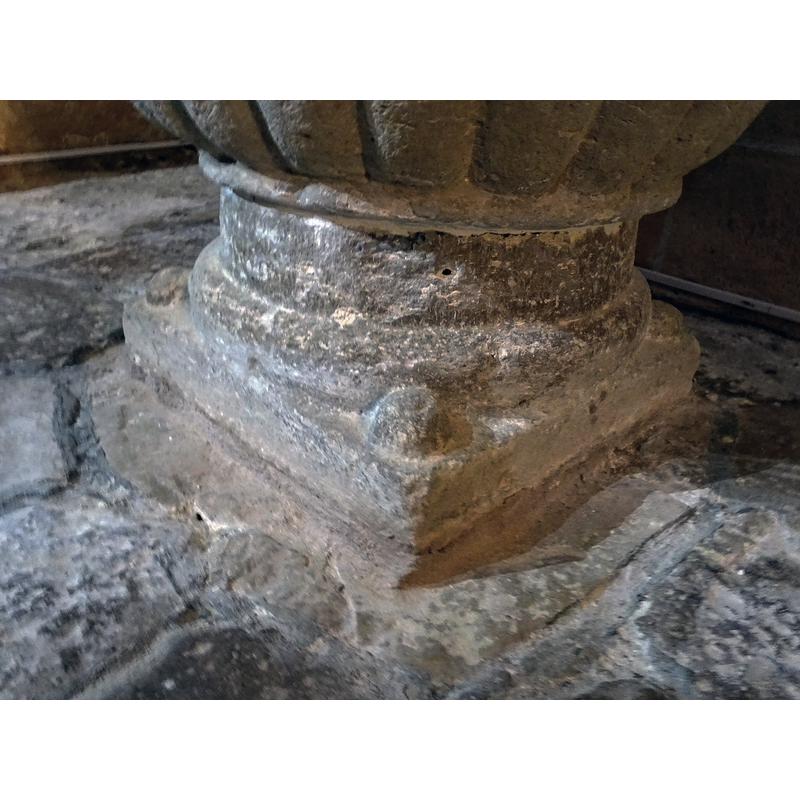 one at each angle of lower base