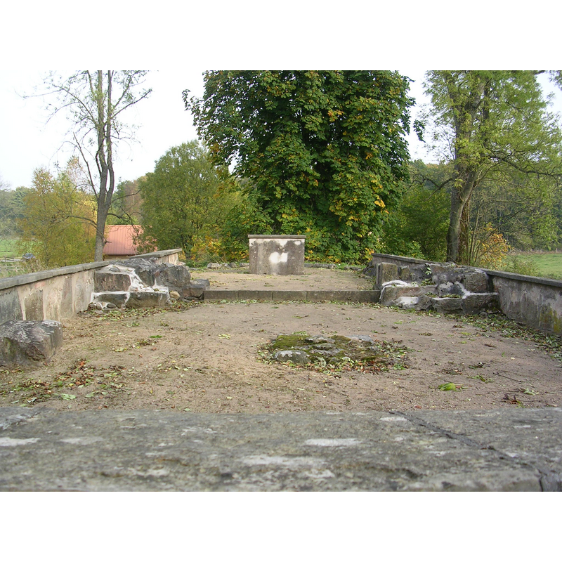 Source caption: "Tjörnarps gamla kyrka" -- showing the church interior from the west end of the nave, with the bases of the chancel arch pillars still visible; some of the ruins were reconstructed in the 1960s