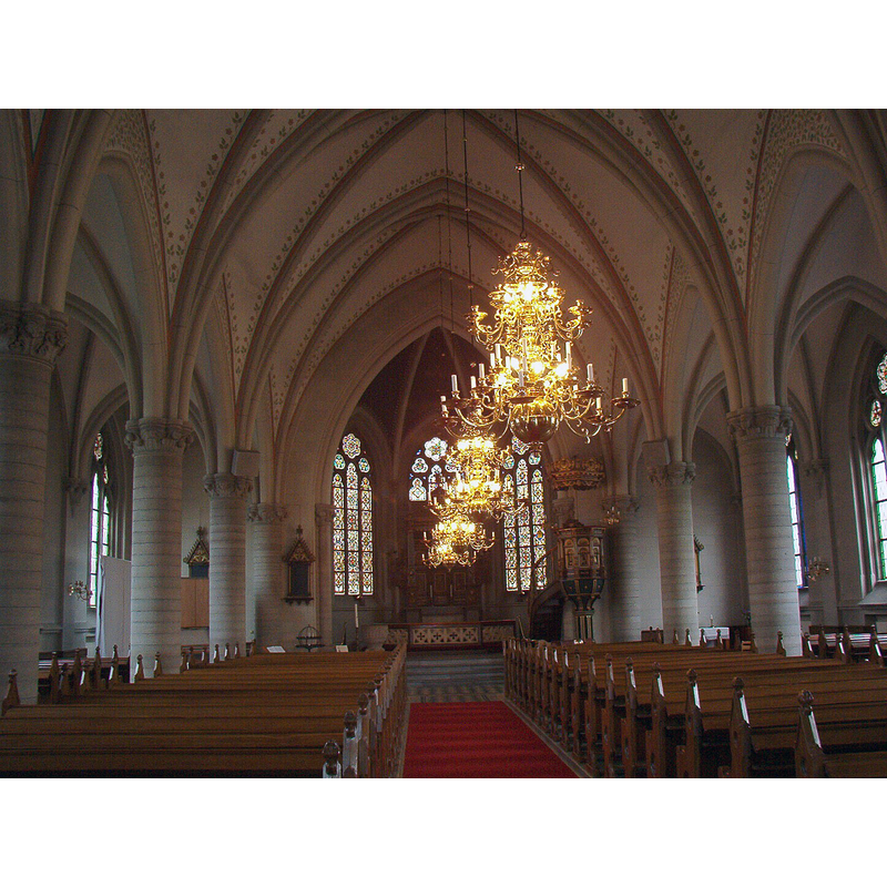 Source caption: "Tygelsjö kyrka interior" -- the medieval font is vvisible at the far [east] end of the left [north] bank of benches  [NB: is this font a replica copy of the medieval one?]