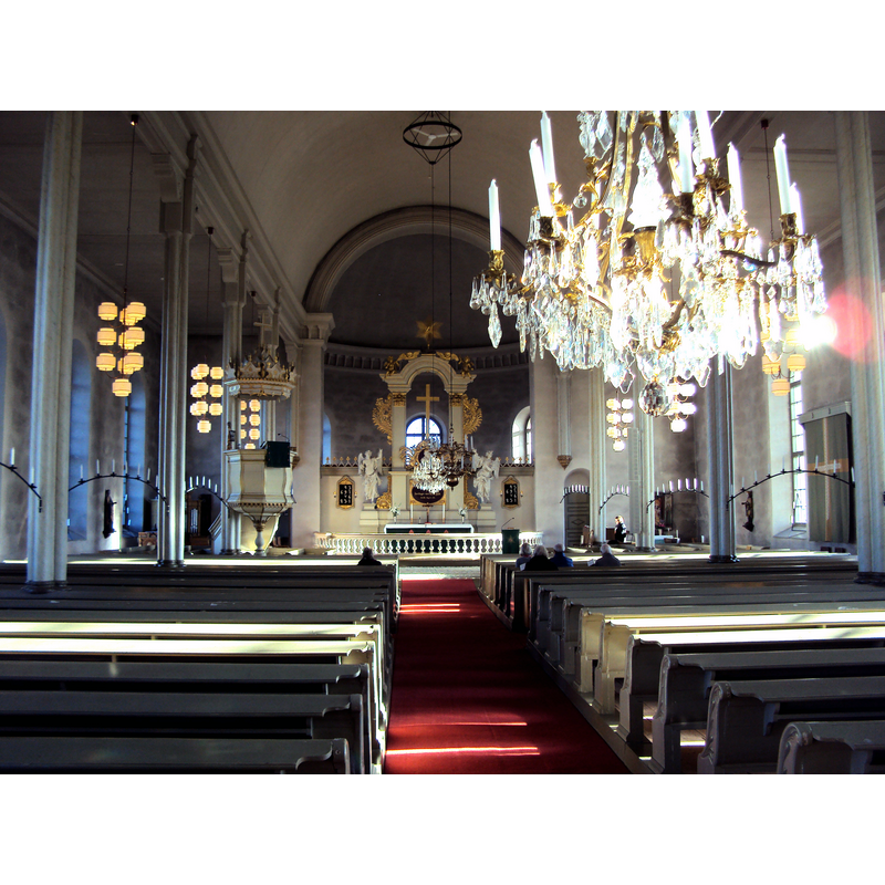 the baptismal font is partially visible in the south [right] apse, in the extreme right side of the image