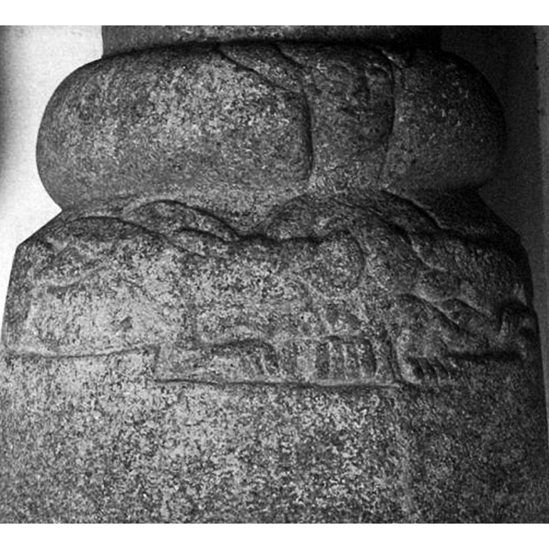 carved upside down and with two odd-looking beasts at her breast: a dragon and an a lion according to DK [cf. FontNotes] [NB: the image has been rrotated 180 degrees]
