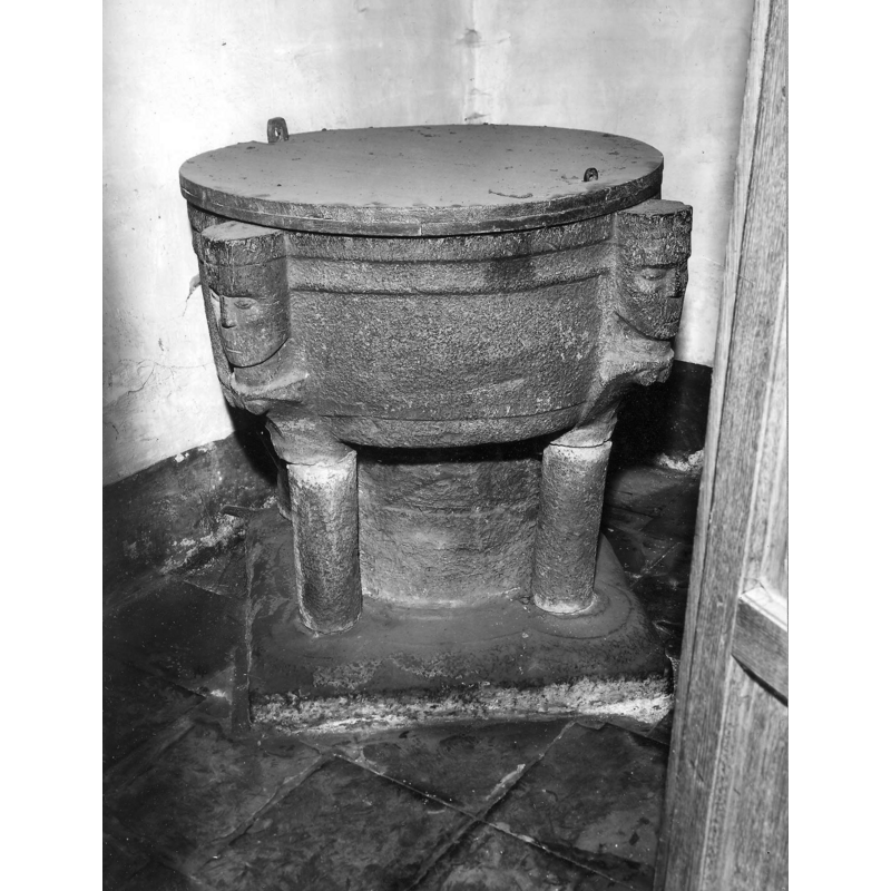this font cover later replaced by a newer one with metal ornaments and ring handle