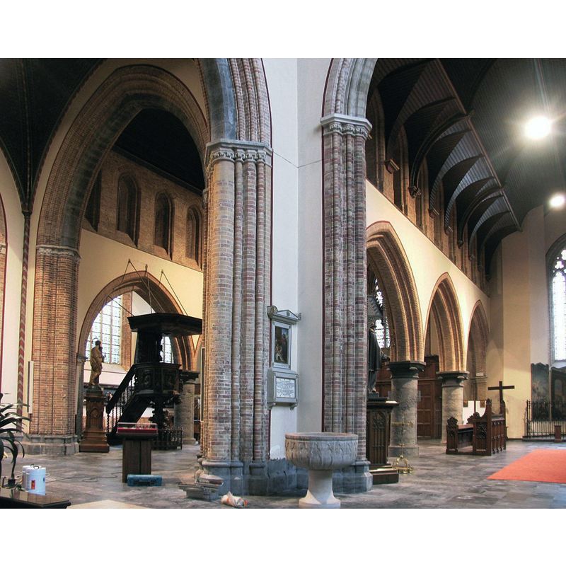 the Gotland Paradise font in the Bruges church; the pedestal base is a later replacement