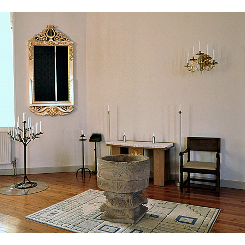 showing the medieval font inside the new church