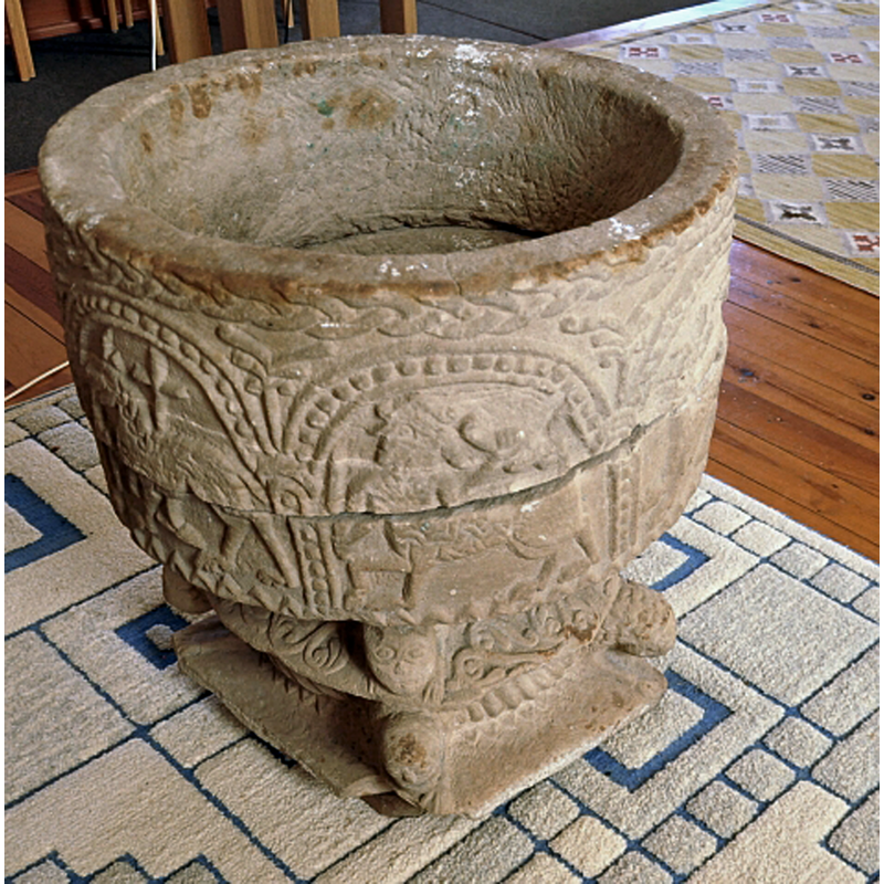 showing the medieval font inside the new church